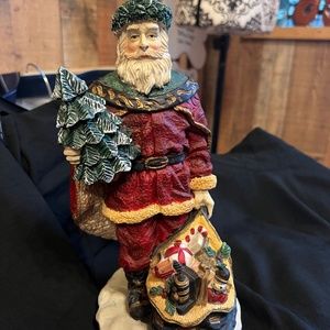 CHRISTMAS SANTA HOLDING SMALL TREE AND TOY BAG RESIN MATERIAL